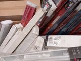many different types of electronic devices in a box