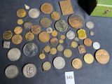 a lot of coins that are on the table