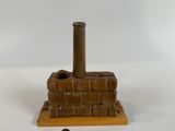 a small piece of wood that is on top of a table