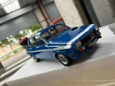 a toy car that is sitting on top of a box