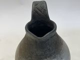 an image of a black vase on a white background
