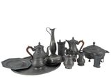a lot of silver items that are on a tray