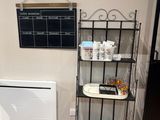 an image of a kitchen with a blackboard on the wall and a white radiator