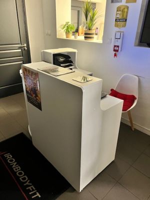 a picture of a kitchen with a microwave and a refrigerator