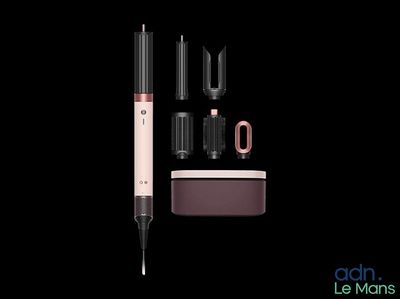 a close up of a device with a black background and a black background