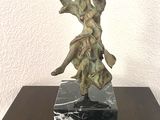 statue of a man on a horse on a marble base