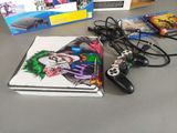 a video game and a game controller sitting on a table