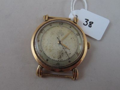 a gold wrist watch with a price tag attached to it
