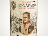a bottle of wine that has a picture of a man on it