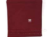 a close up of a red scarf with a white logo on it