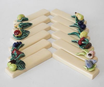 four pieces of fruit and vegetables on top of each other