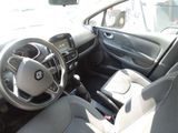 a car with a steering wheel and a dash board
