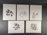 four prints of animals on the wall above a bed