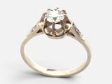 l'image d'une bague ornée d'un diamant