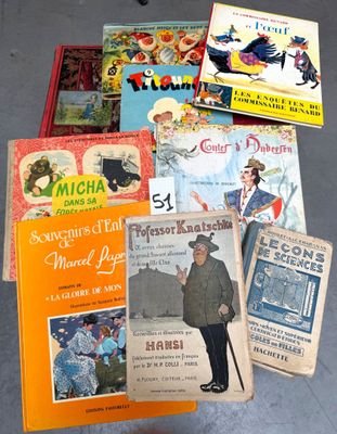 many children ' s books that are on the floor