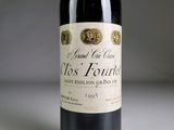 a bottle of wine that is sitting on a table