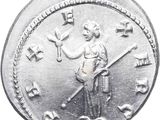 a silver coin with a man holding a guitar