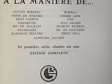 an old book with a black and white image of a man in a suit