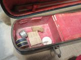 a piece of luggage that is open on the floor