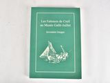 a green book with a picture of a sailboat on it
