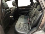 the back seats of a car are black with black trims