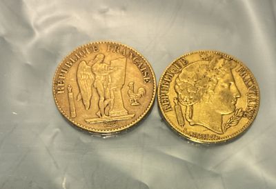 two gold sovereigns, one of which is a sovereign and the other of which is a sovereign