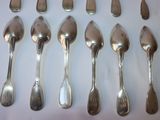a lot of spoons and spoon spoons on the table