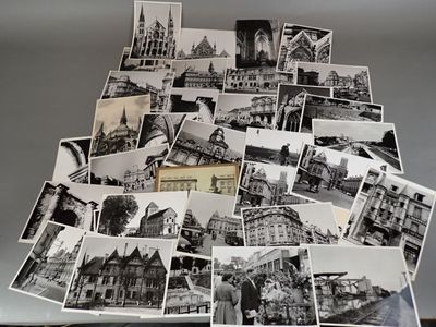 several black and white photos of a bunch of old buildings