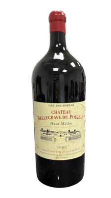 a bottle of wine that is sitting on a table