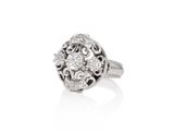 a close up of a diamond ring on a white background