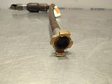 a close up of a metal pipe on a table