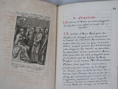 an open book with a picture of a group of people on it