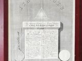 une vieille photo représentant une photo encadrée d'un livre sur lequel figure un dessin à la plume et à l'encre