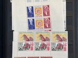 a lot of different stamps on a binder on a table