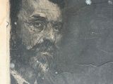 portrait of a man with a beard and mustache in a black and white photo