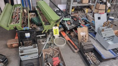 a lot of tools that are sitting on the floor