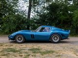a blue sports car parked on the side of the road