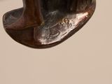 a bronze statue of a man riding a horse