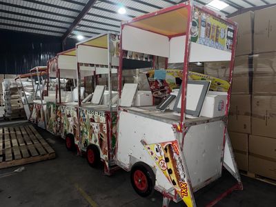 a small cart that has a lot of items on it