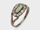 an oplite and diamond ring