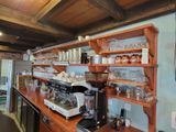 many glasses on the shelves in the kitchen