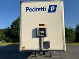 a delivery truck that is parked in a parking lot