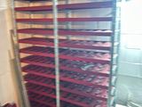 many racks of food that are in the kitchen