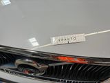 a close up of a car with a sticker on it