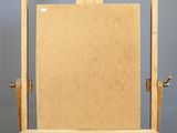 an easel with a piece of cardboard on it