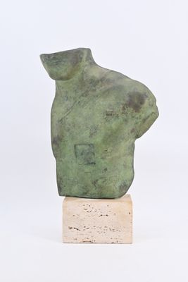 sculpture of a man ' s head on a wooden base
