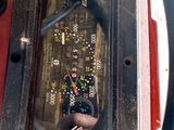 a close up of a car dashboard with a clock on it