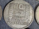 a lot of coins that are sitting on a table