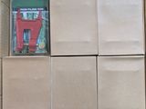 a cardboard box with a bunch of books inside of it
