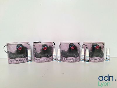 four mugs with a picture of a cat on them sitting on a table